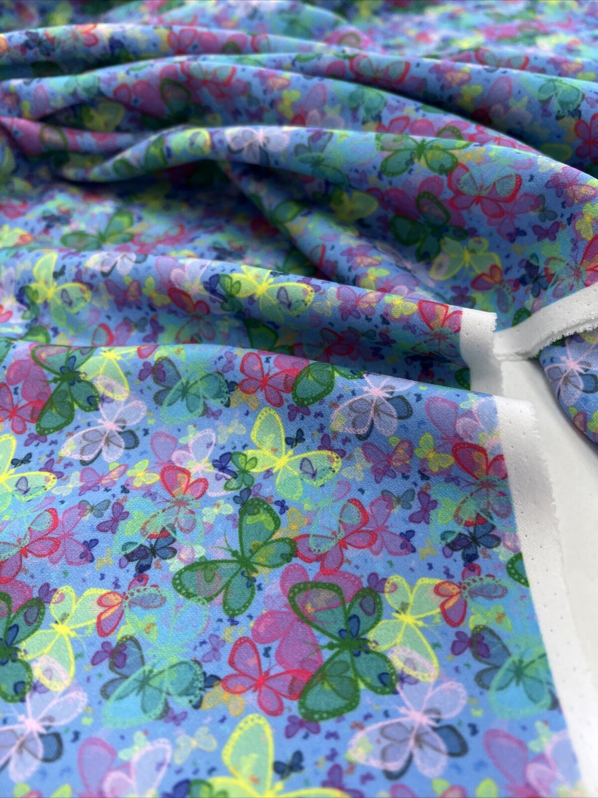 Blue Multi Butterfly Printed Scuba Crepe Jersey Fabric 4 Way Stretch