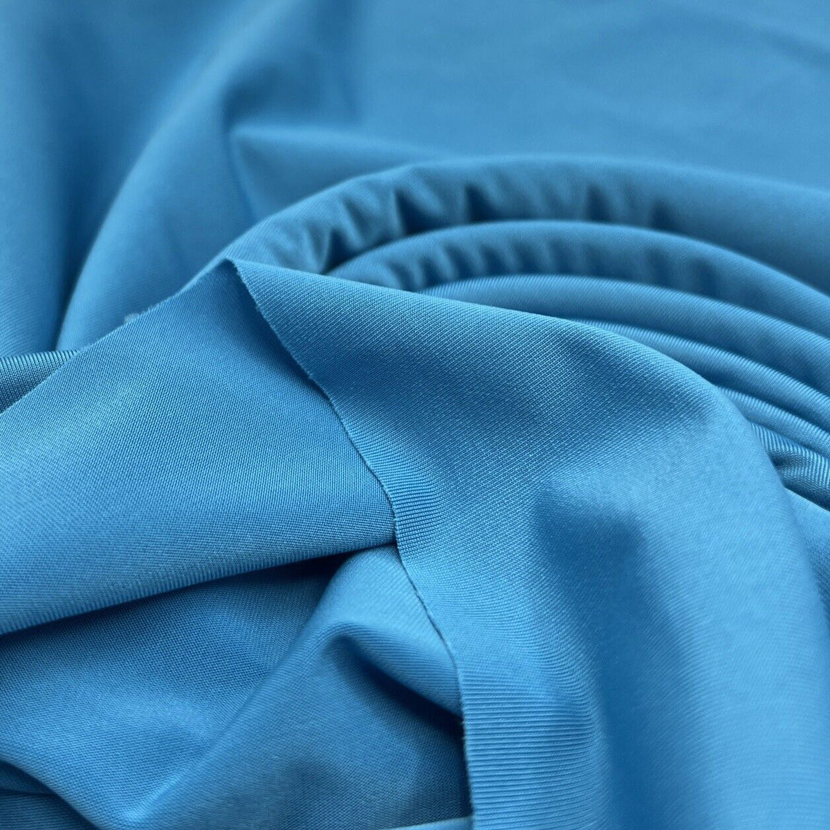 Blue Plain Shiny Soft Touch Slinky 4 Way Stretch Fabric