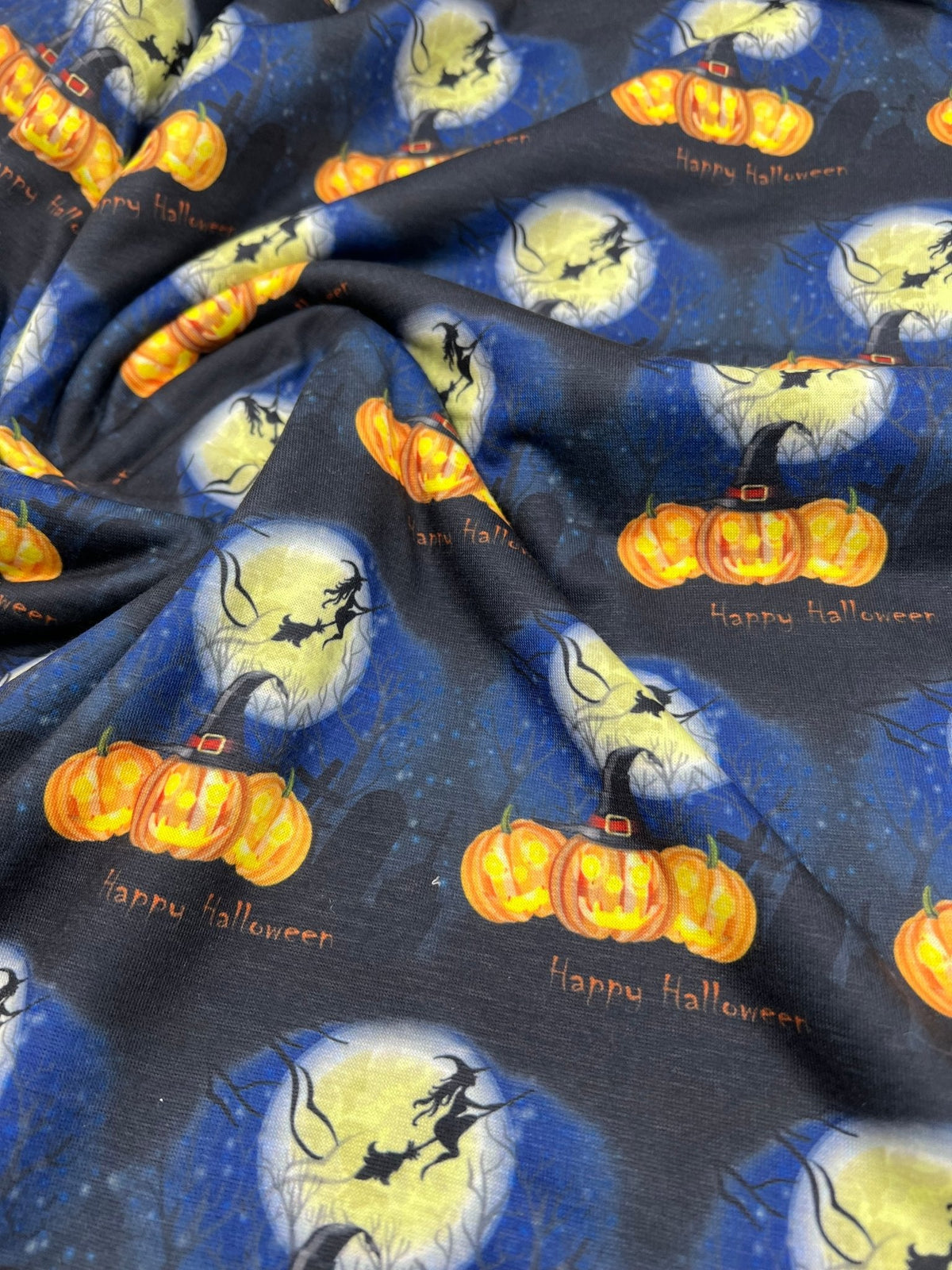Blue Pumpkin Witch Halloween Print Spun Poly Stretch Fabric