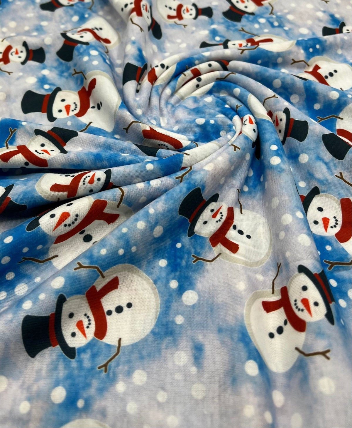 Blue Snow Snowman Print Soft Spun Poly Stretch Fabric