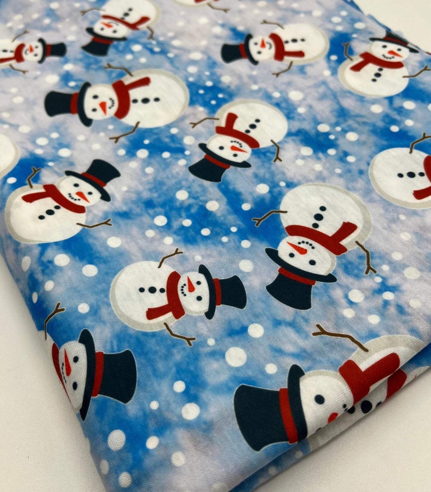 Blue Snow Snowman Print Soft Spun Poly Stretch Fabric