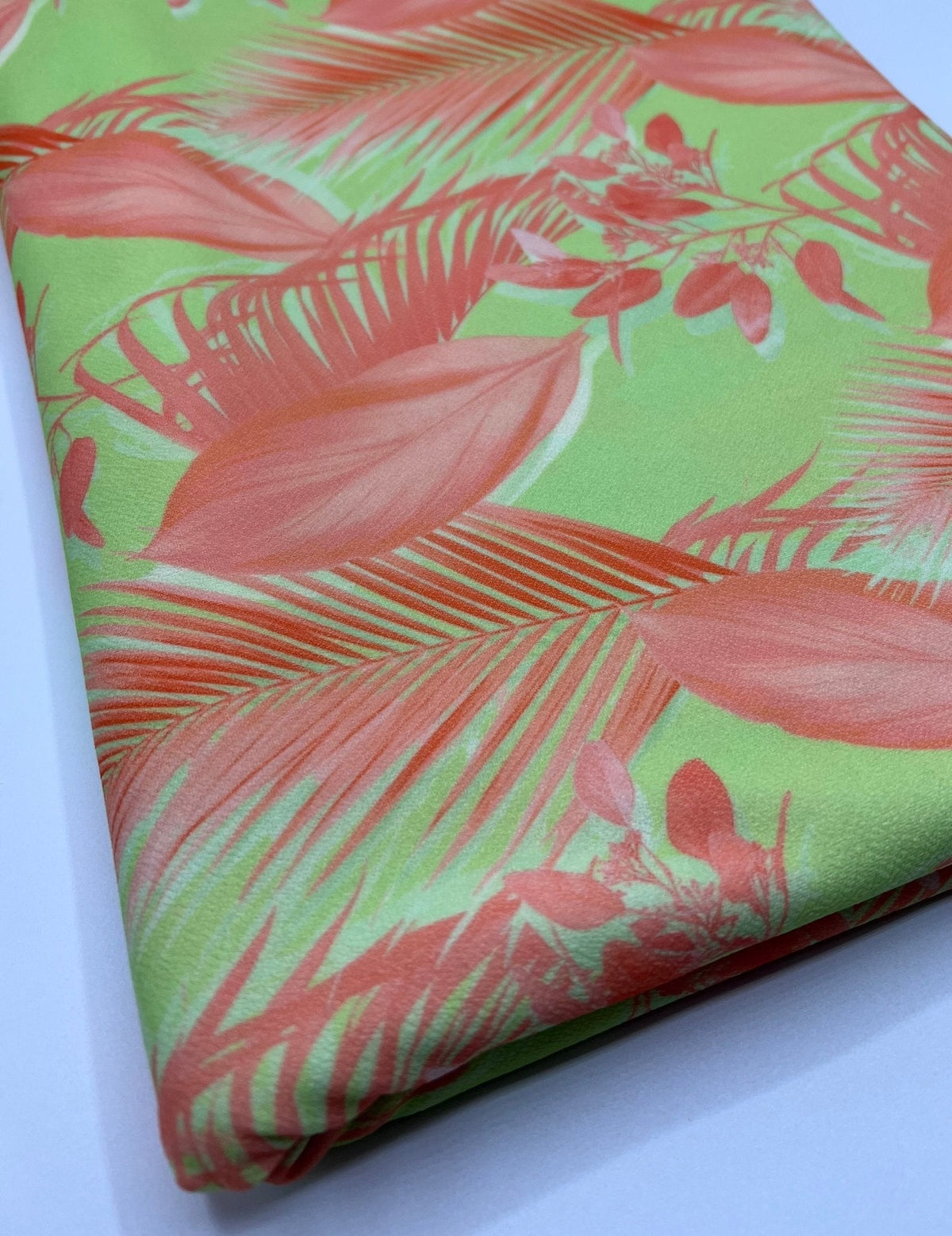 Bright Green & Orange Leaf Print Lightweight Jersey Crepe Fabric 4 Way Stretch