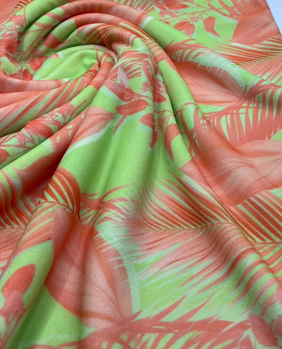 Bright Green & Orange Leaf Print Lightweight Jersey Crepe Fabric 4 Way Stretch
