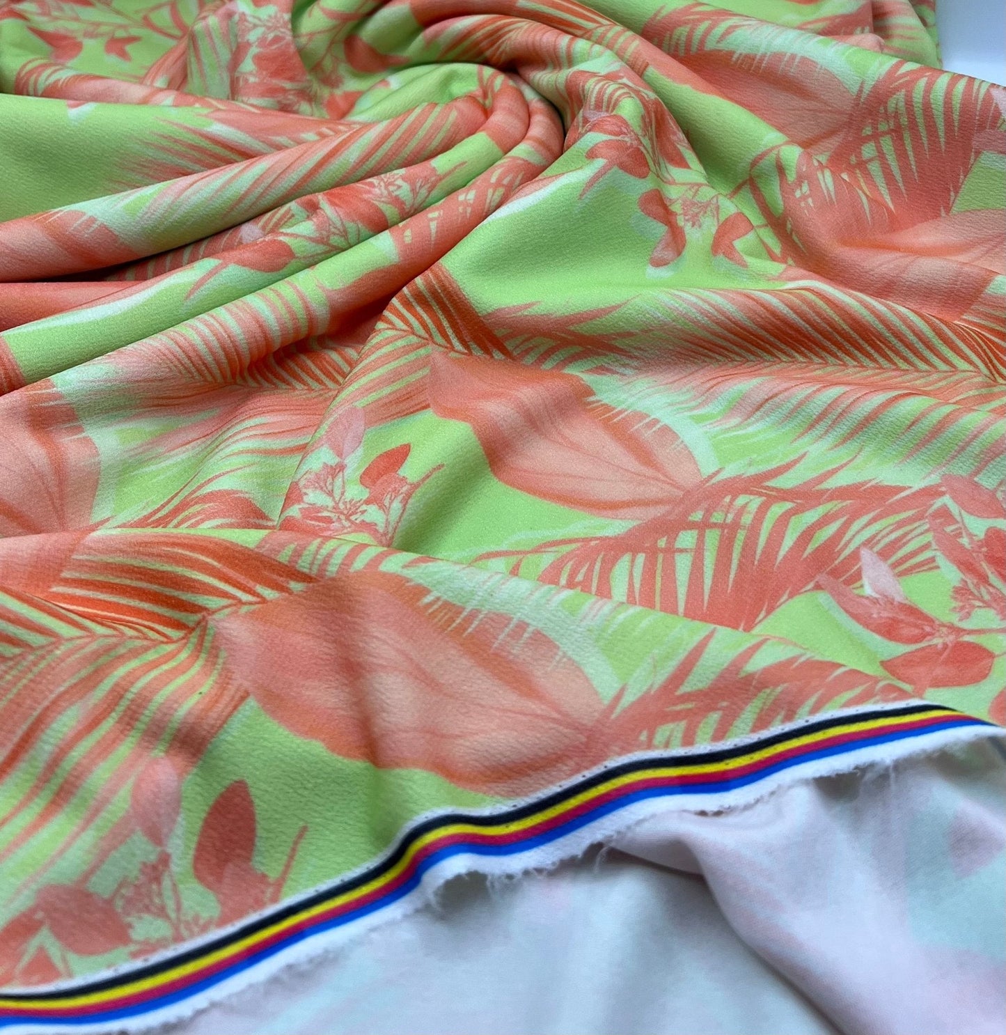 Bright Green & Orange Leaf Print Lightweight Jersey Crepe Fabric 4 Way Stretch