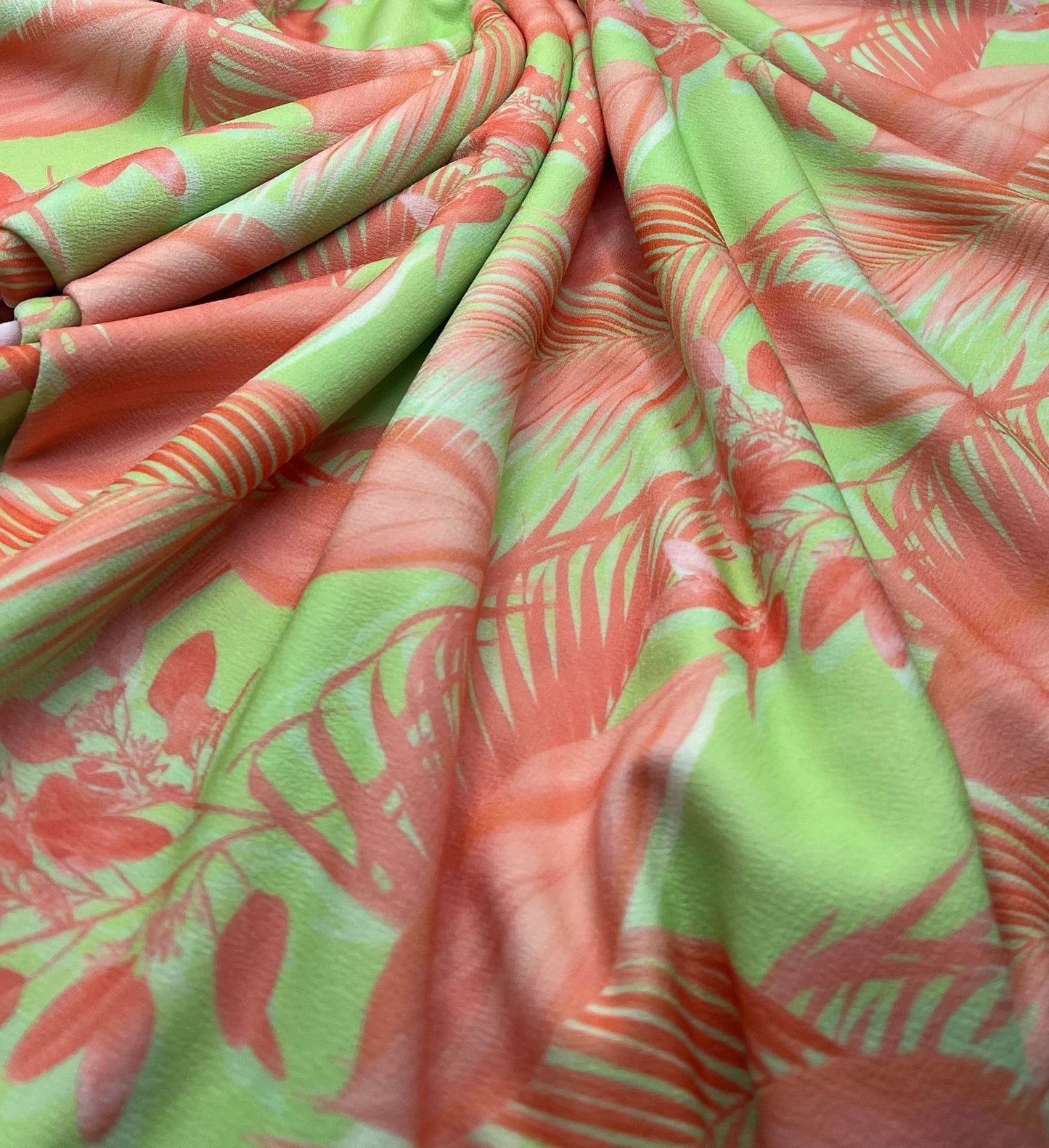 Bright Green & Orange Leaf Print Lightweight Jersey Crepe Fabric 4 Way Stretch