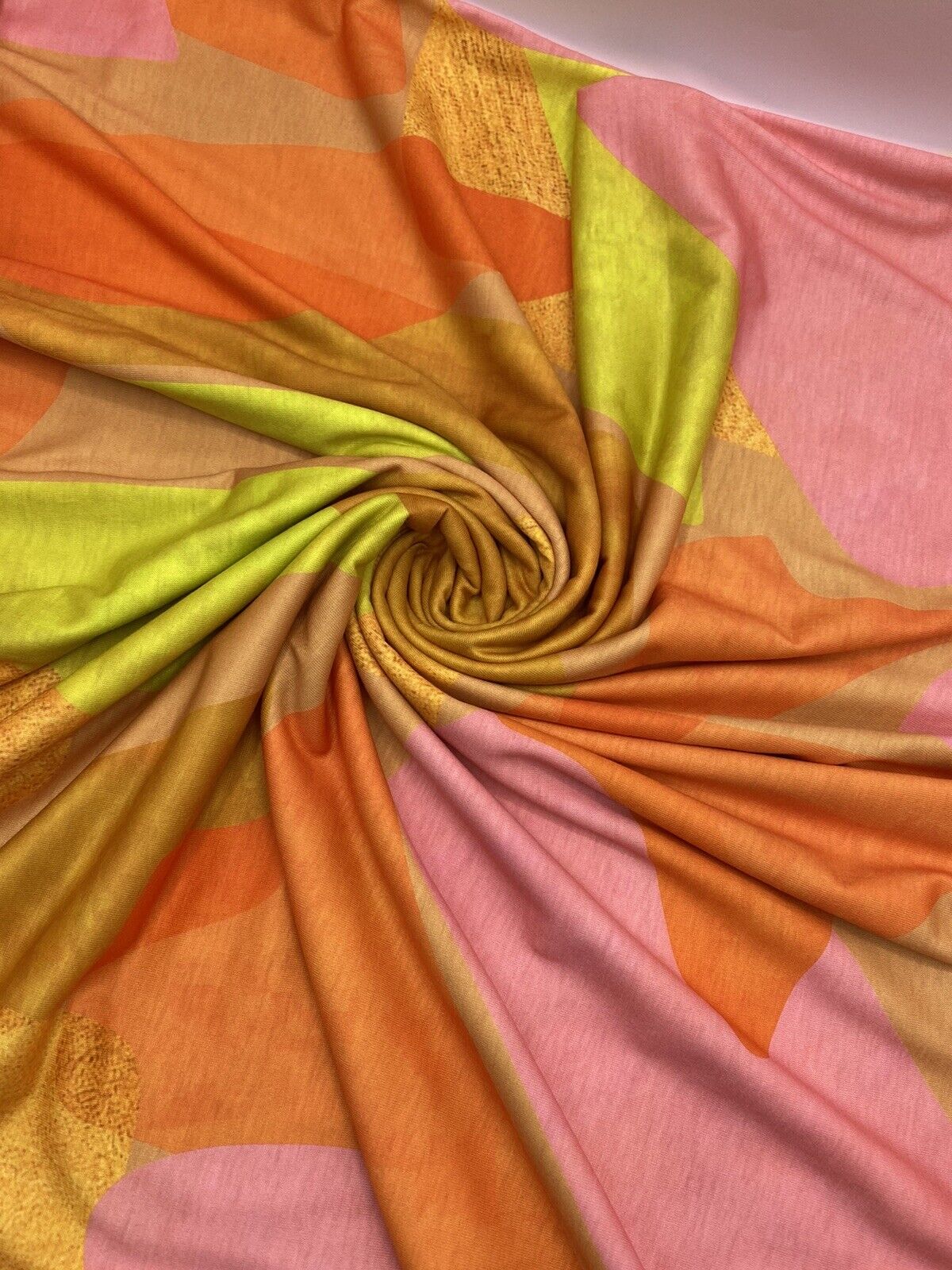Bright Orange, Pink & Yellow Multi Print Spun Poly Stretch Fabric