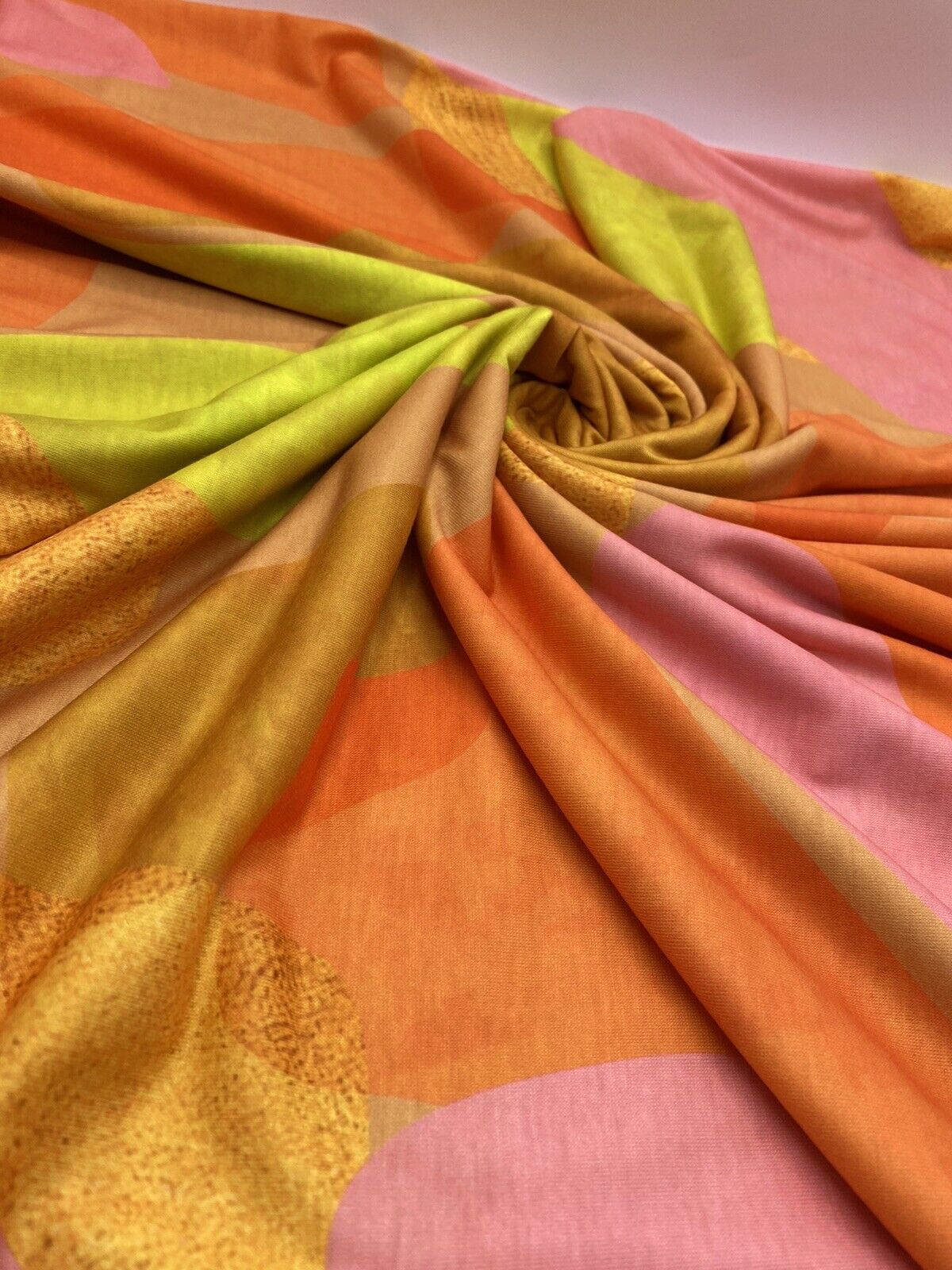 Bright Orange, Pink & Yellow Multi Print Spun Poly Stretch Fabric