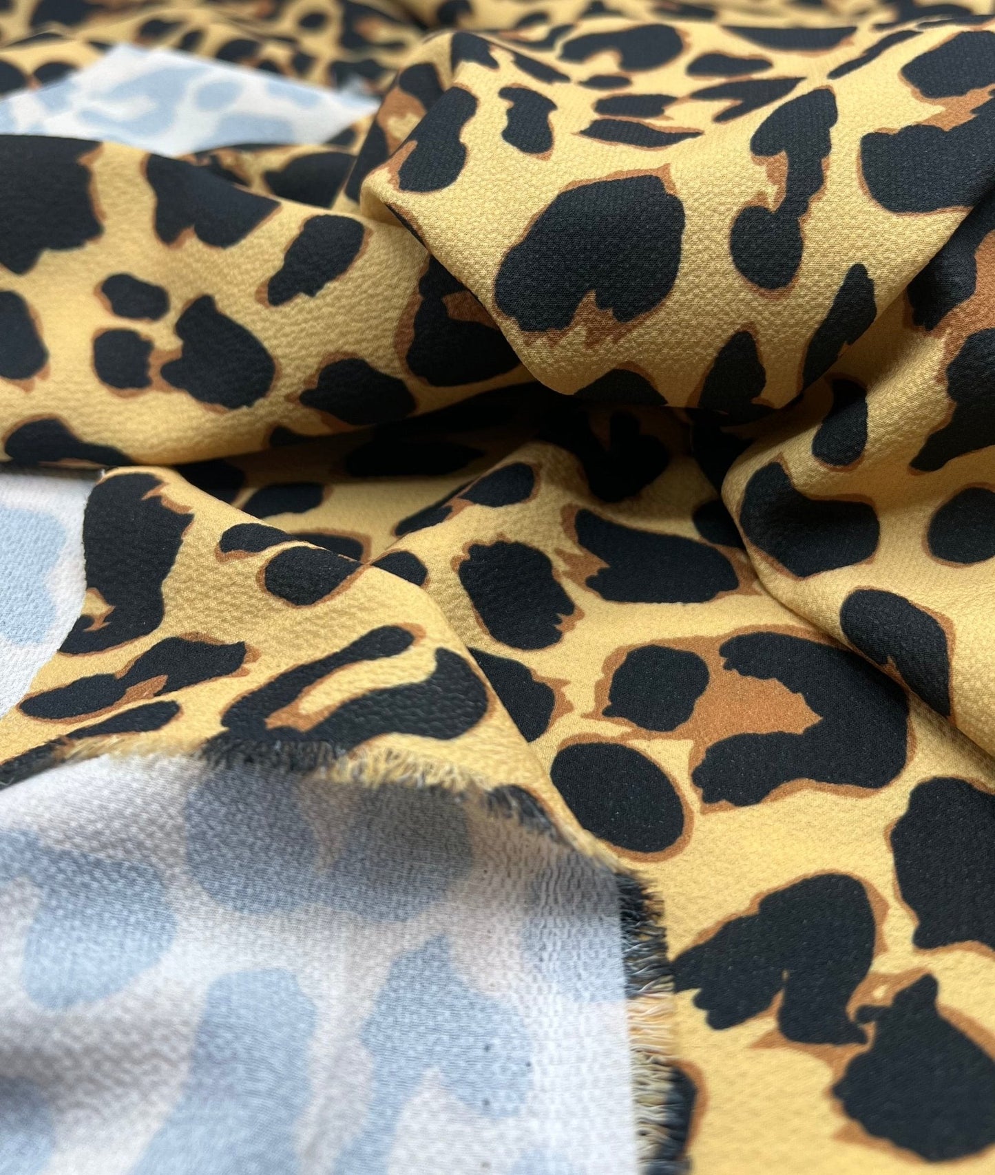 Brown Animal Print Lightweight Bubble Crepe Fabric