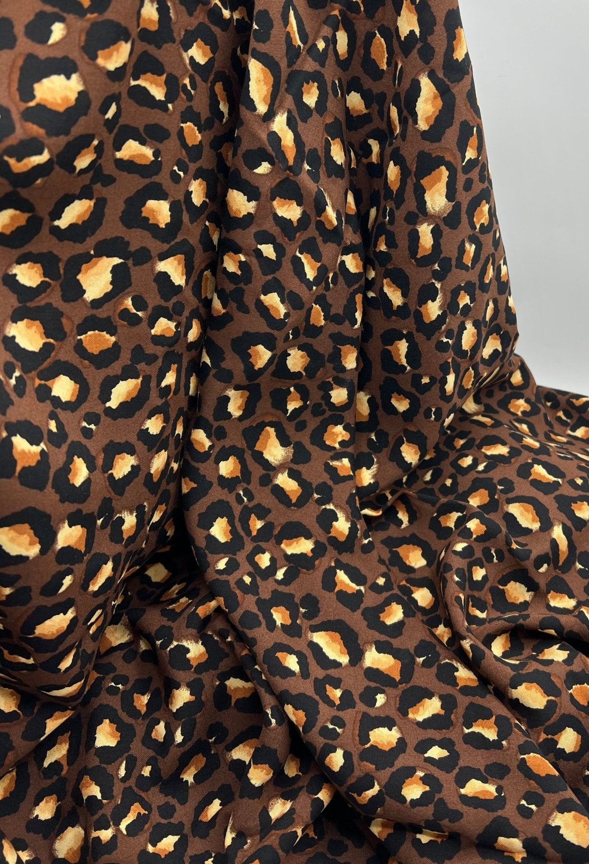 Brown Leopard Animal Lightweight Non Stretch Woven Fabric