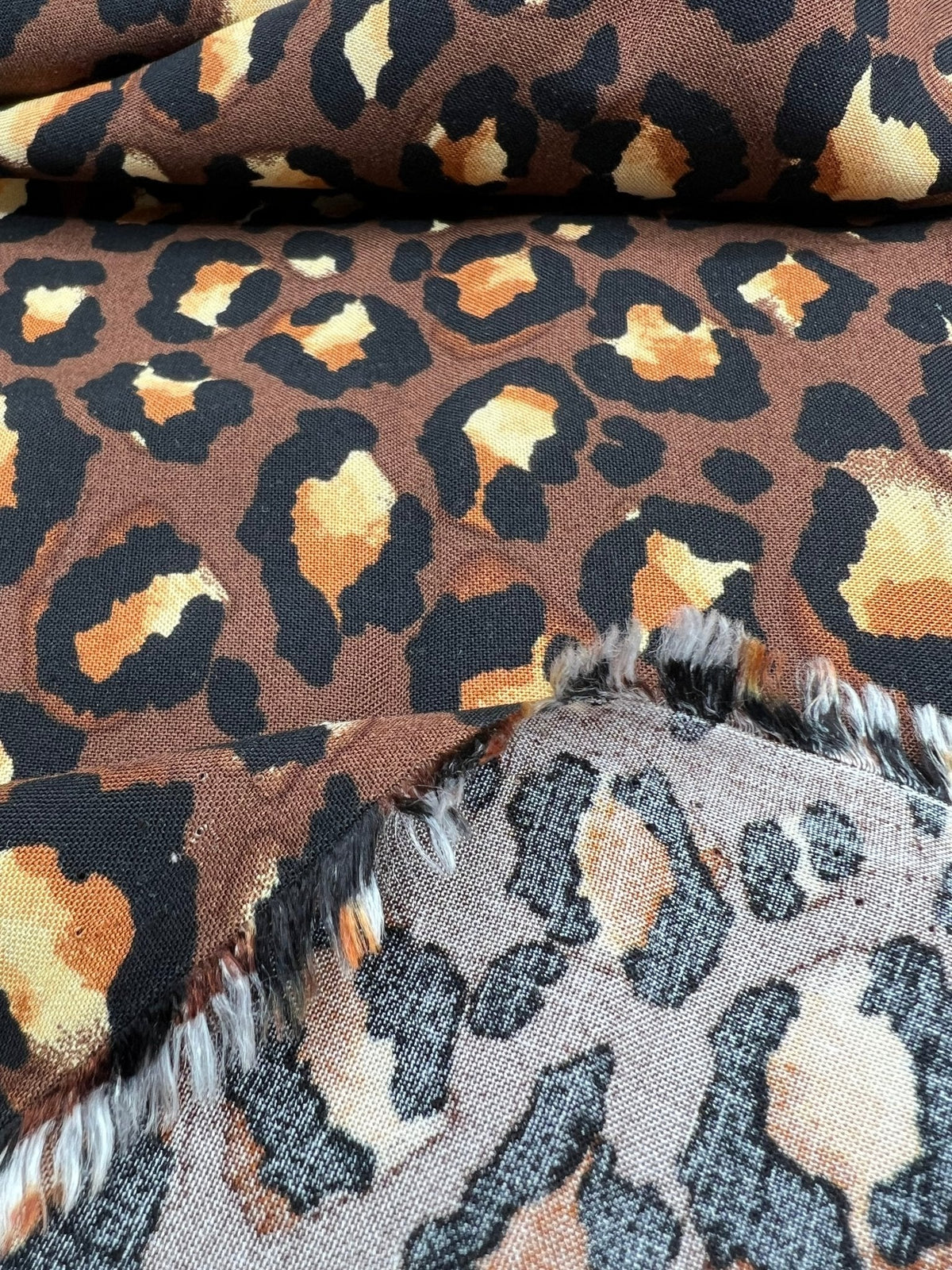 Brown Leopard Animal Lightweight Non Stretch Woven Fabric