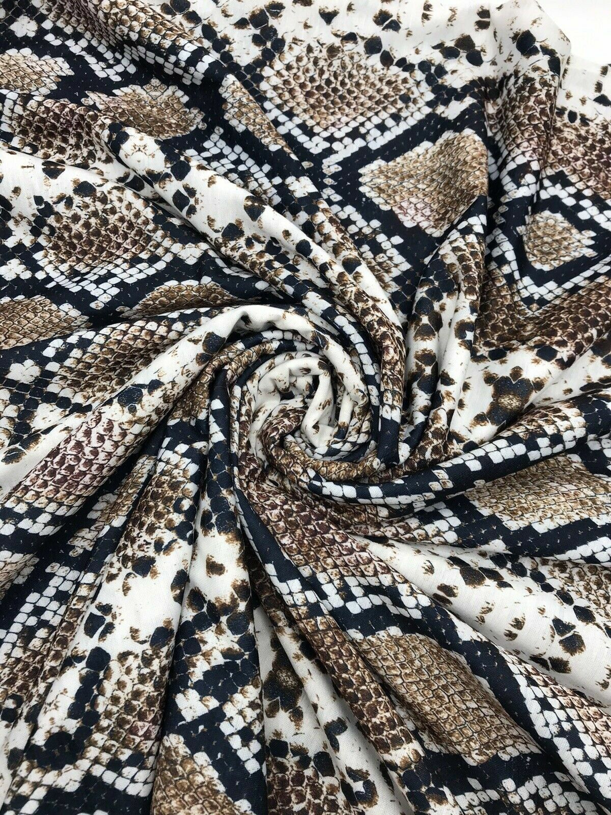 Brown Snakeskin Print Spun Poly Stretch Fabric
