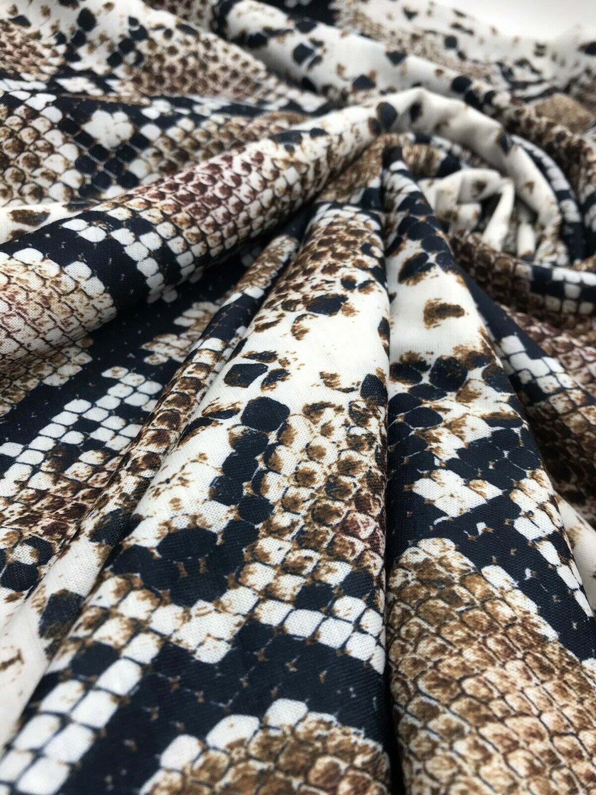 Brown Snakeskin Print Spun Poly Stretch Fabric