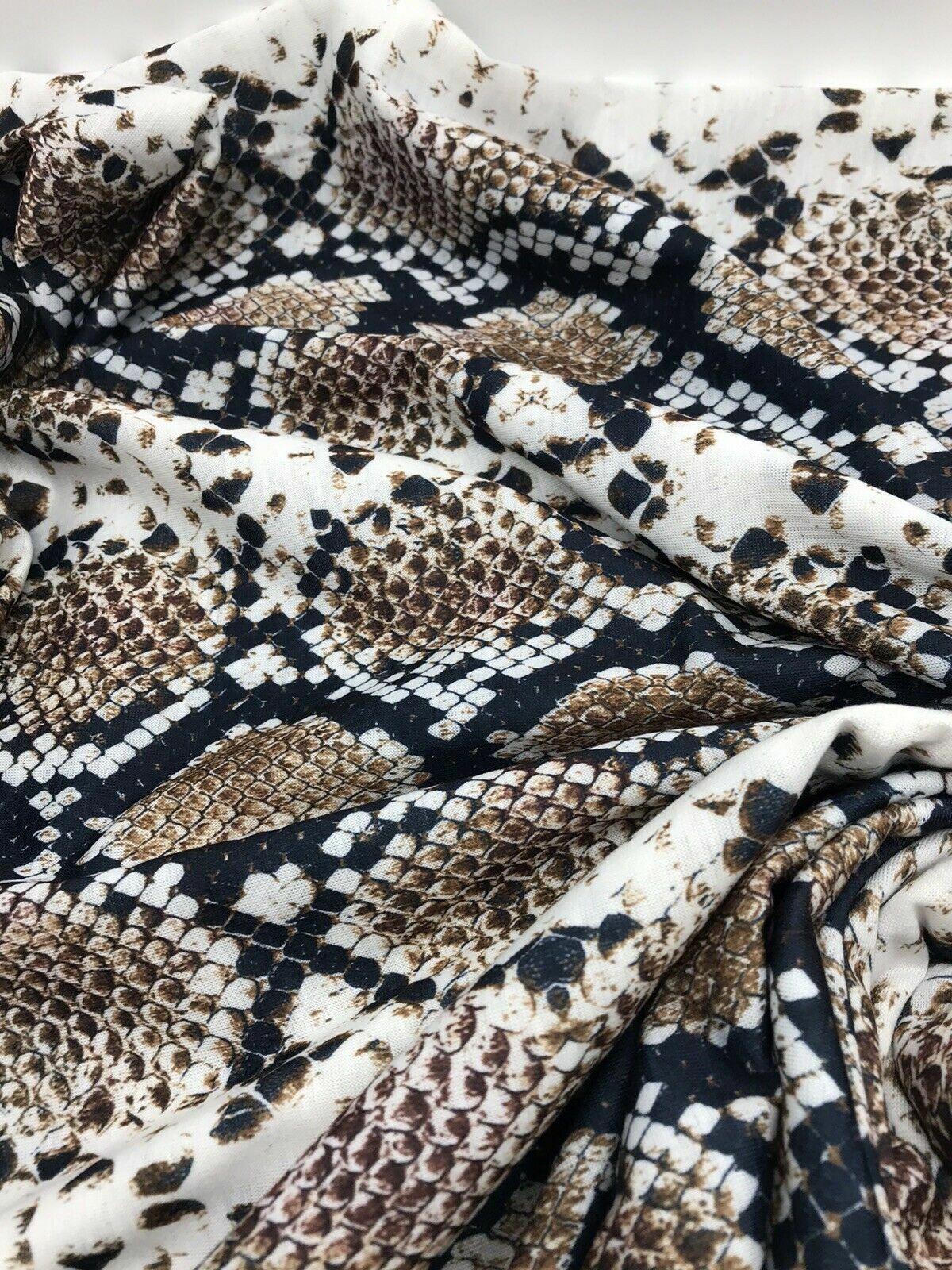 Brown Snakeskin Print Spun Poly Stretch Fabric