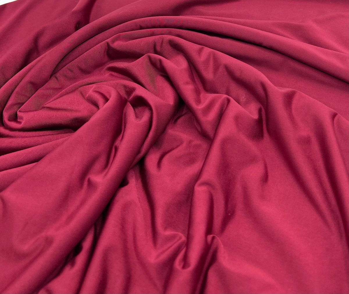 Burgundy Plain Shiny Soft Touch Slinky 4 Way Stretch Fabric