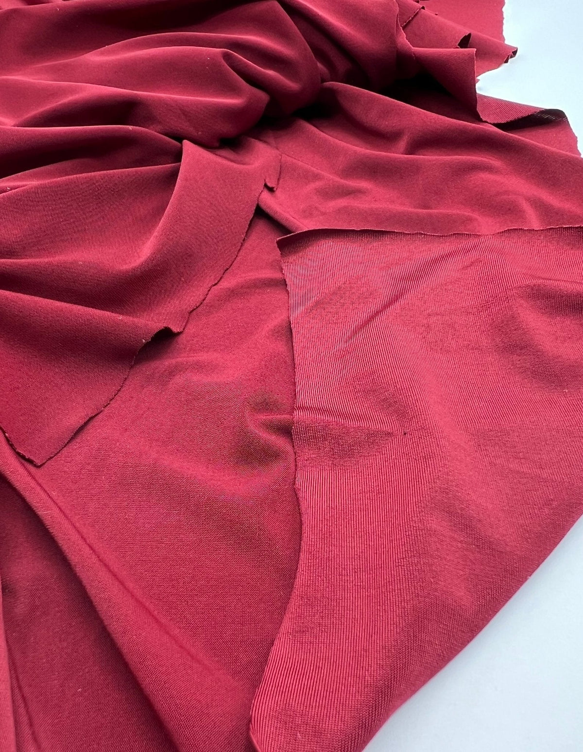 Burgundy Plain Shiny Soft Touch Slinky 4 Way Stretch Fabric