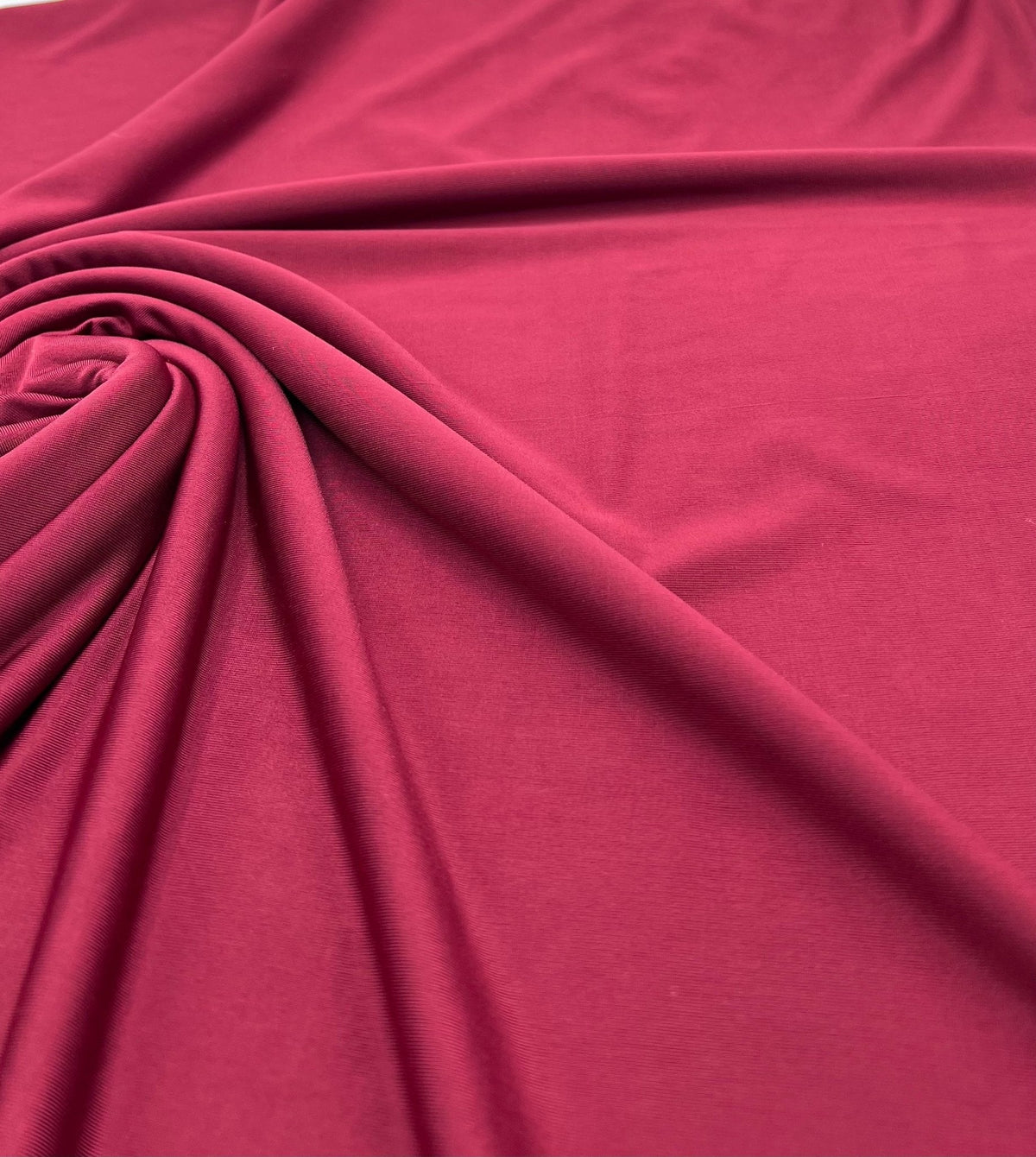 Burgundy Plain Shiny Soft Touch Slinky 4 Way Stretch Fabric