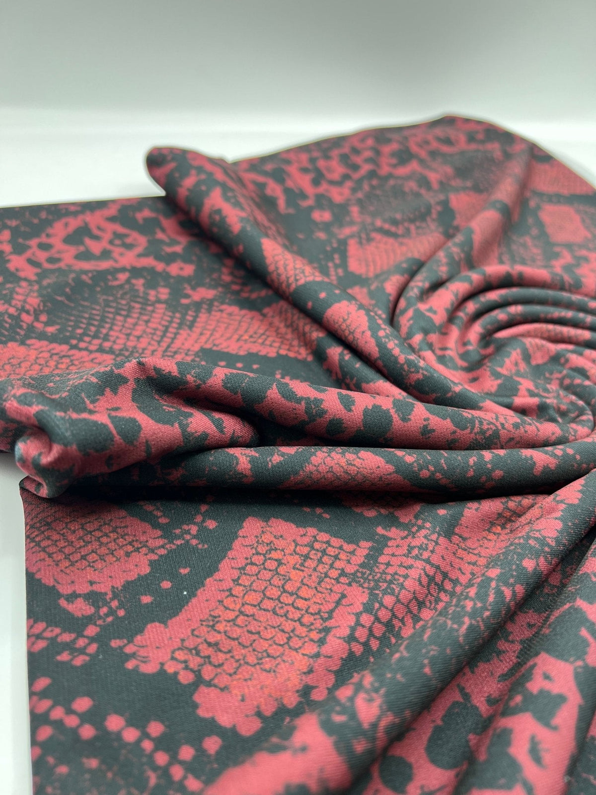 Burgundy Snake Print ITY Fabric
