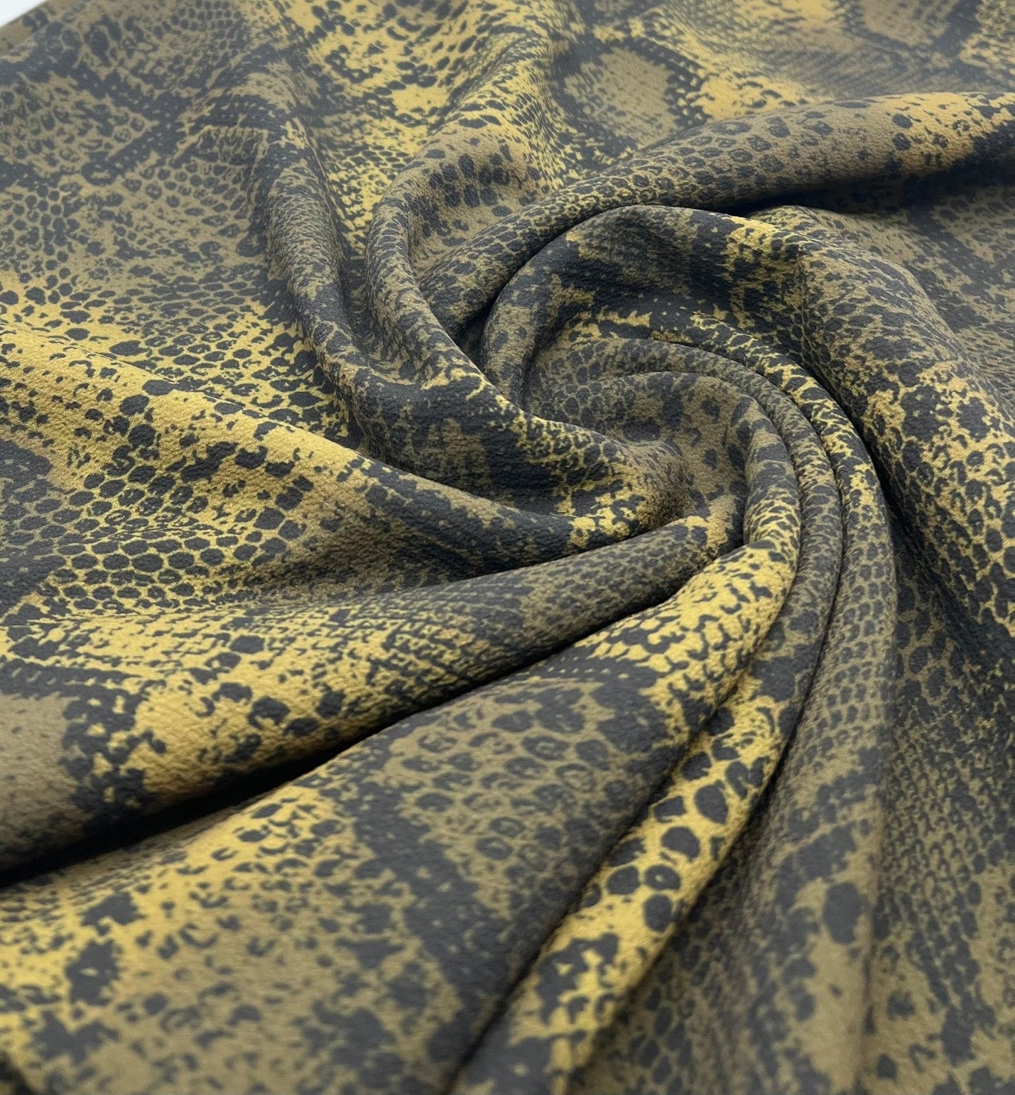 Dark Green Snake Print Light weight Bubble Crepe Fabric