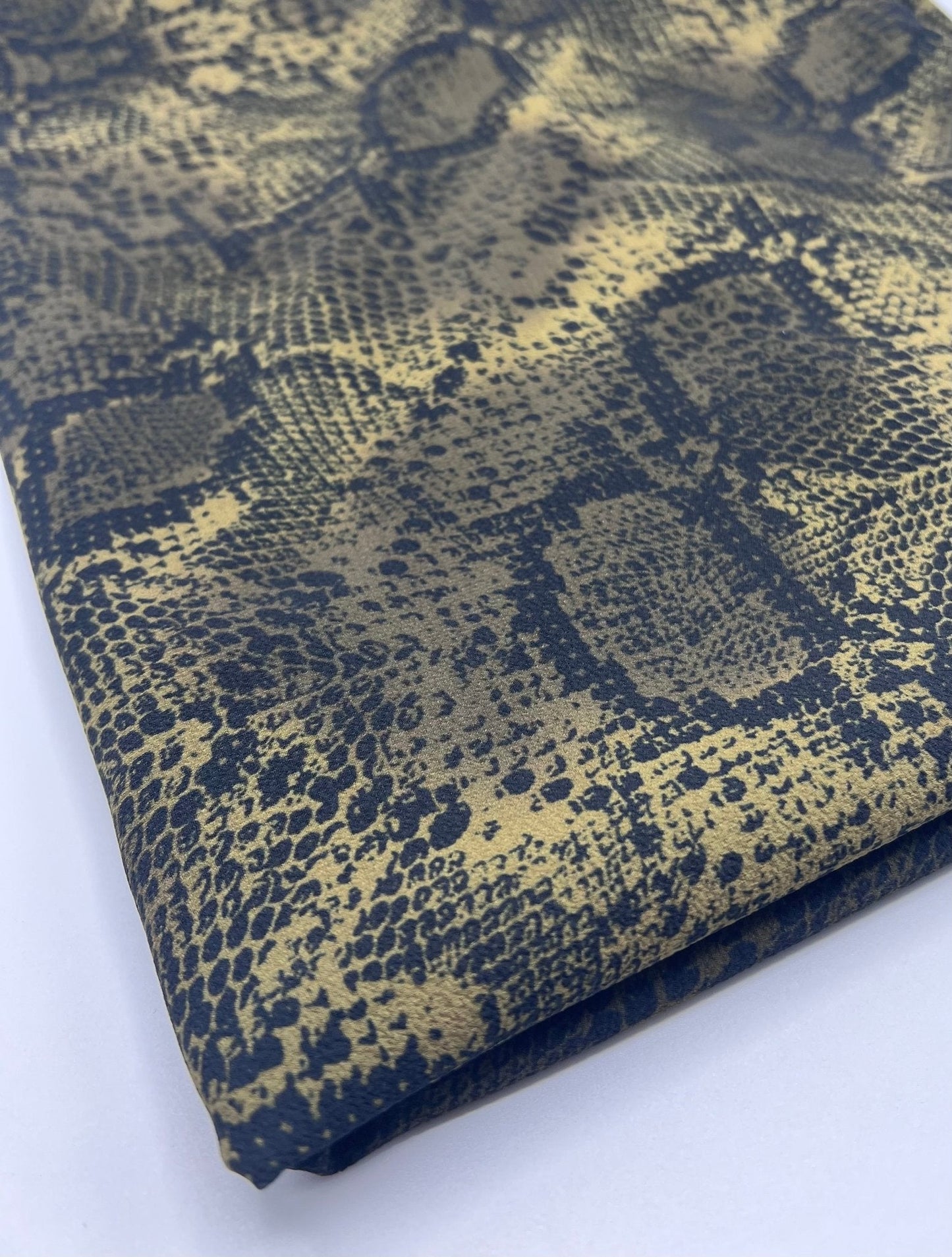 Dark Green Snake Print Light weight Bubble Crepe Fabric