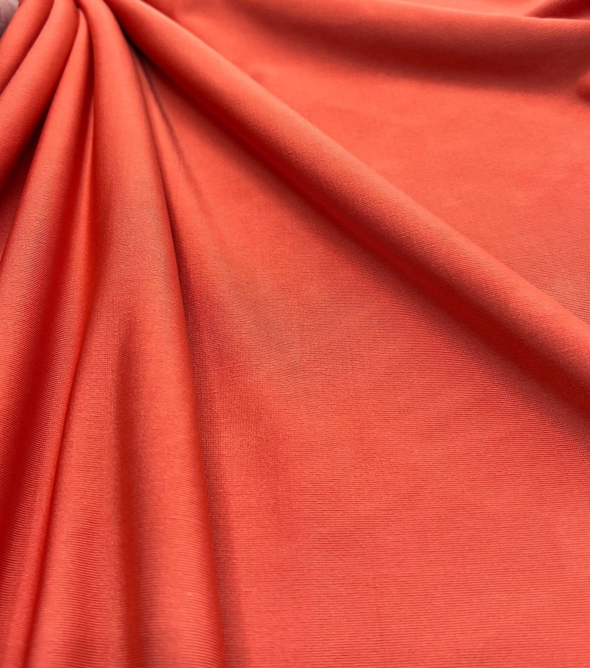 Dark Orange Plain Shiny Soft Touch Slinky 4 Way Stretch Fabric