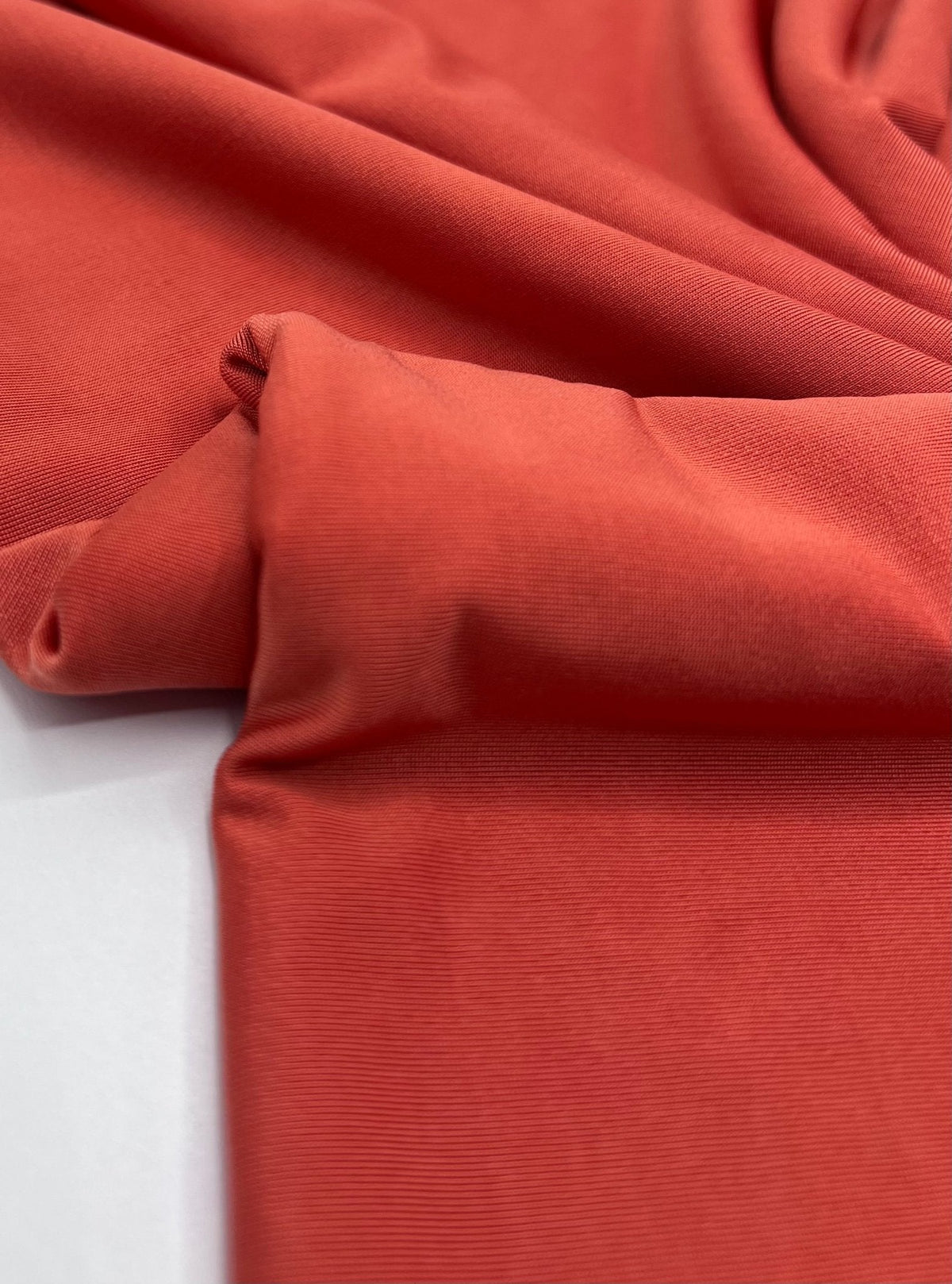 Dark Orange Plain Shiny Soft Touch Slinky 4 Way Stretch Fabric