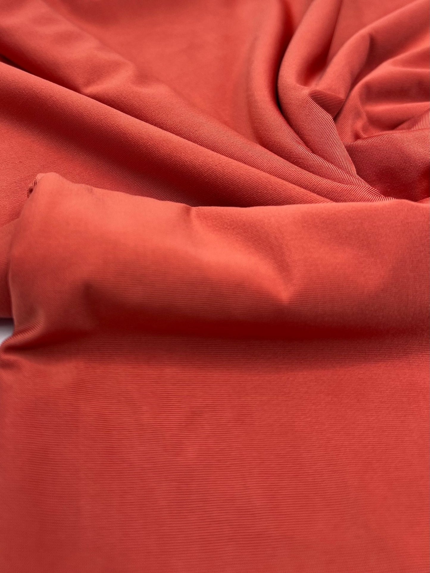 Dark Orange Plain Shiny Soft Touch Slinky 4 Way Stretch Fabric