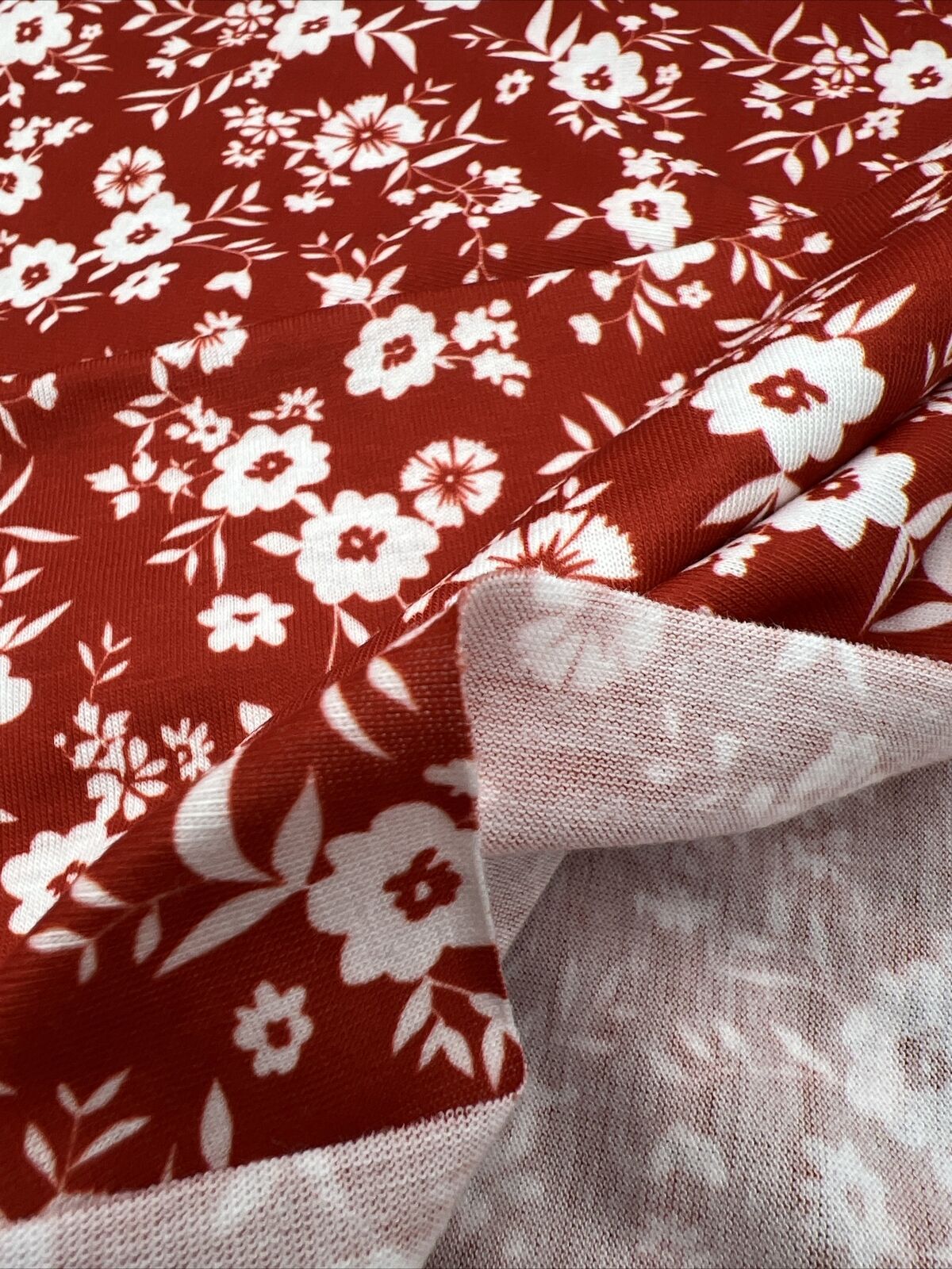 Dark Red Ditsy Floral Print Spun Poly Stretch Fabric