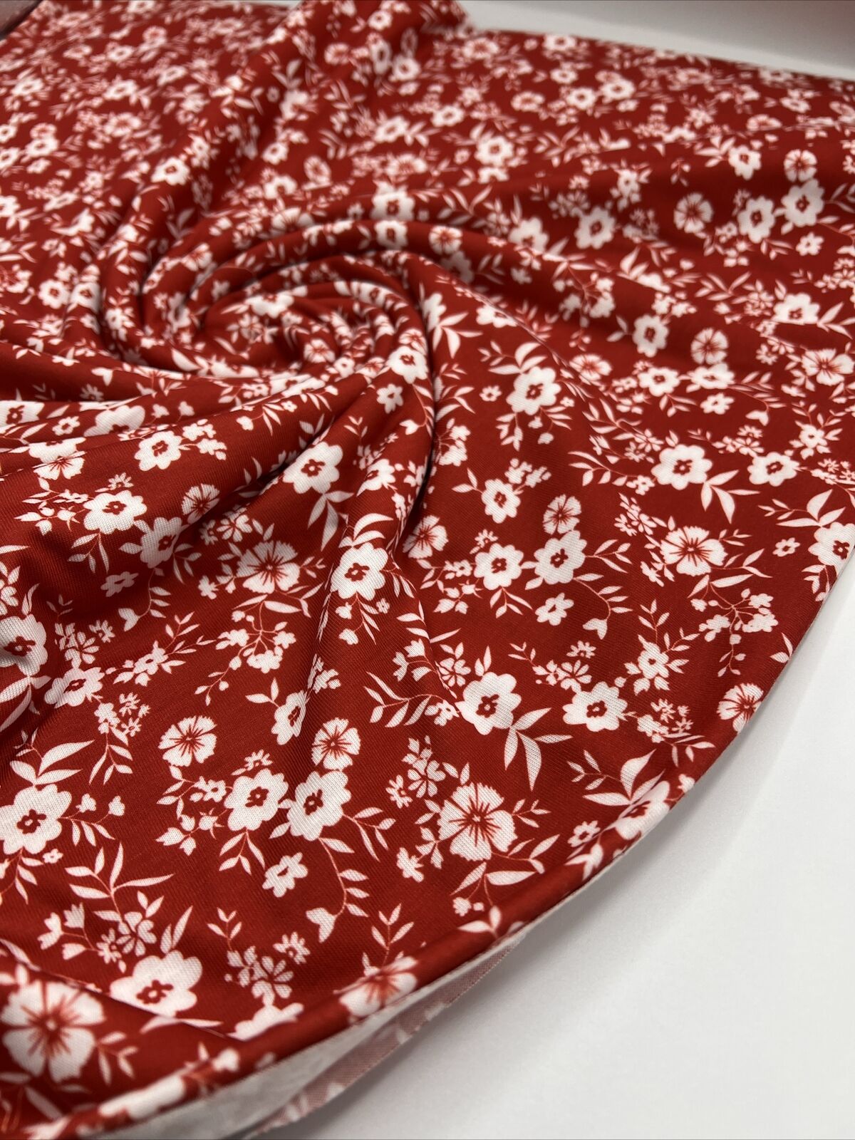 Dark Red Ditsy Floral Print Spun Poly Stretch Fabric