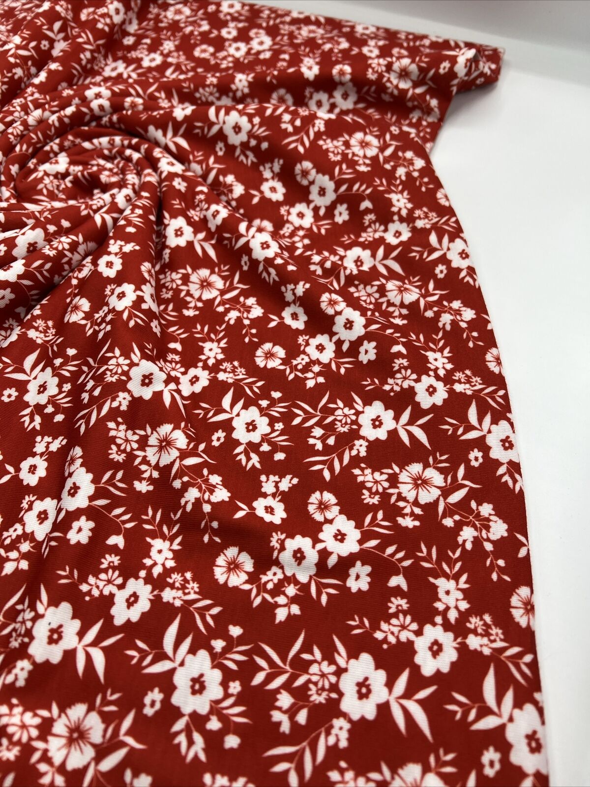 Dark Red Ditsy Floral Print Spun Poly Stretch Fabric
