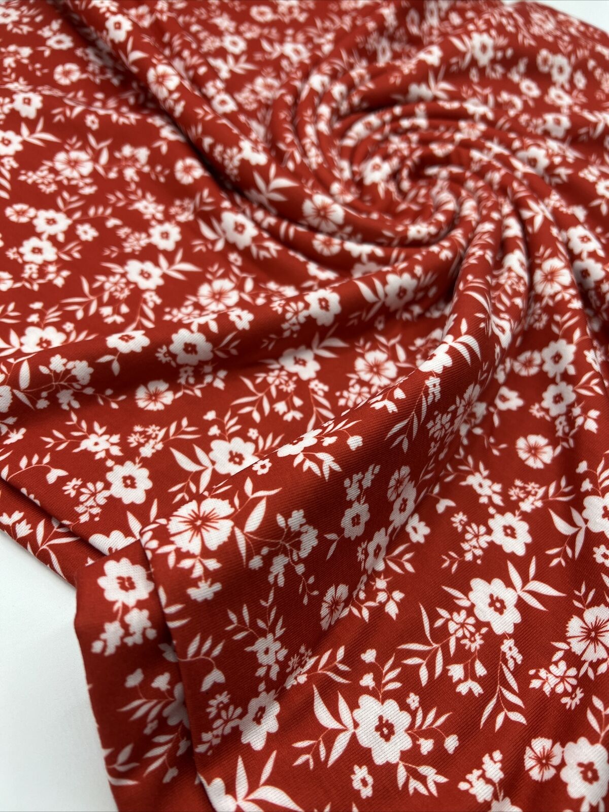 Dark Red Ditsy Floral Print Spun Poly Stretch Fabric