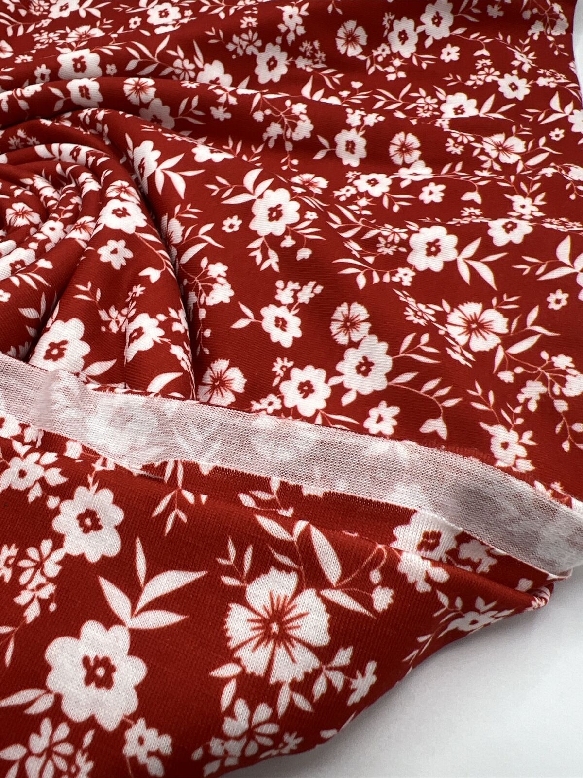 Dark Red Ditsy Floral Print Spun Poly Stretch Fabric
