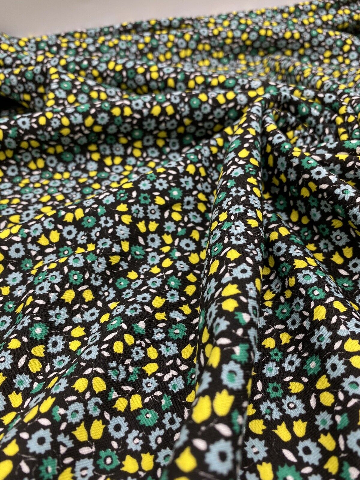 Ditsy Green & Yellow On Black Floral Print Viscose Elastane Fabric