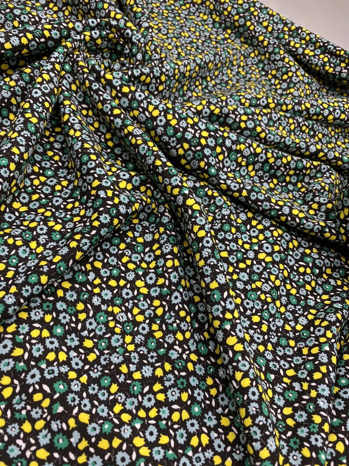 Ditsy Green & Yellow On Black Floral Print Viscose Elastane Fabric