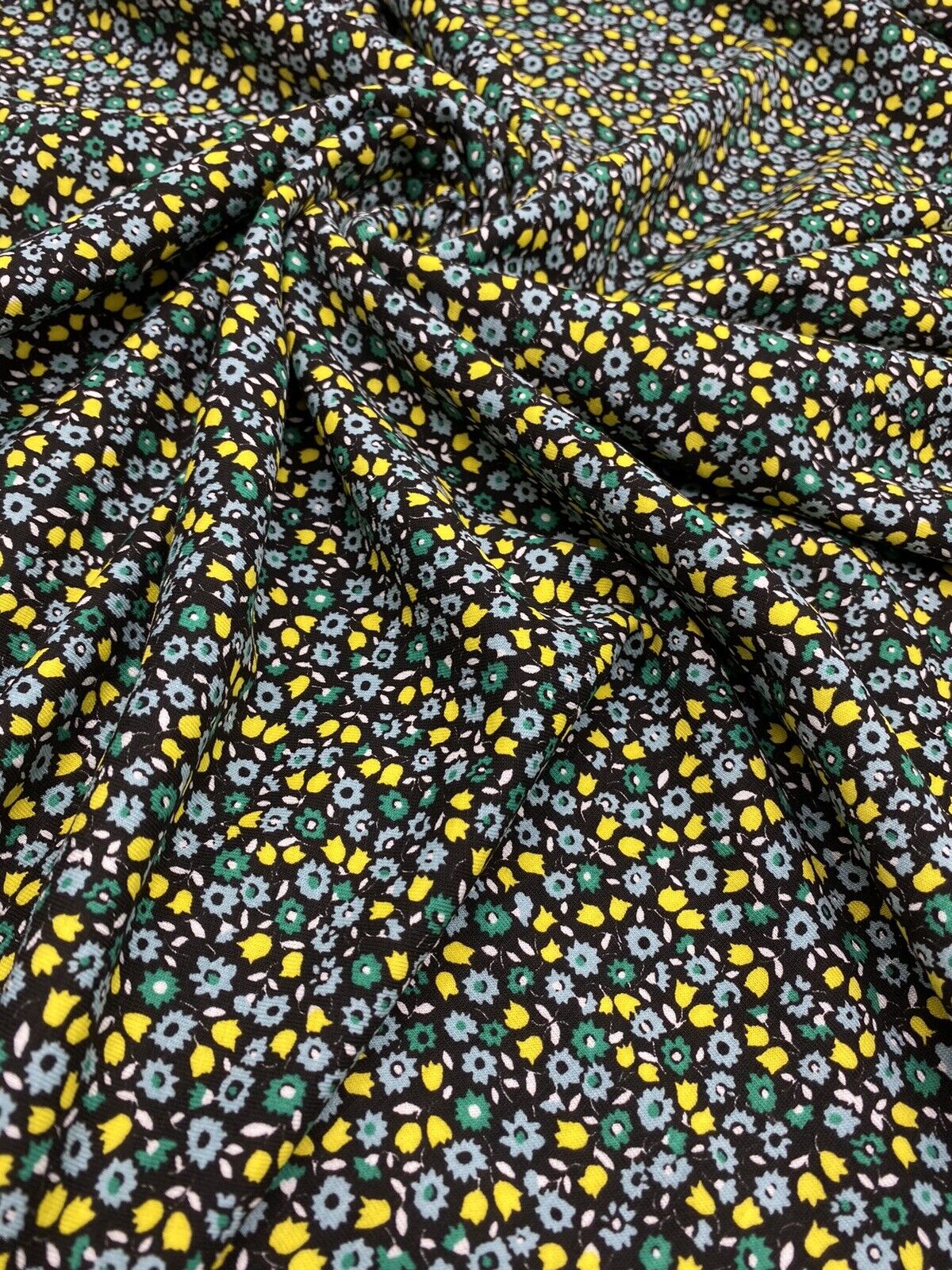 Ditsy Green & Yellow On Black Floral Print Viscose Elastane Fabric