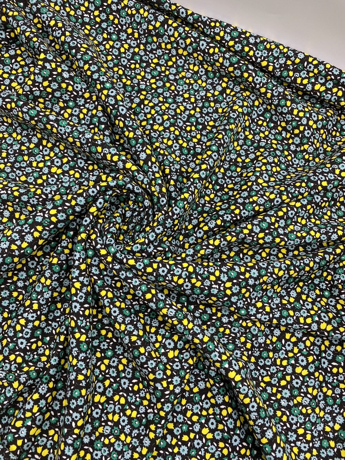 Ditsy Green & Yellow On Black Floral Print Viscose Elastane Fabric