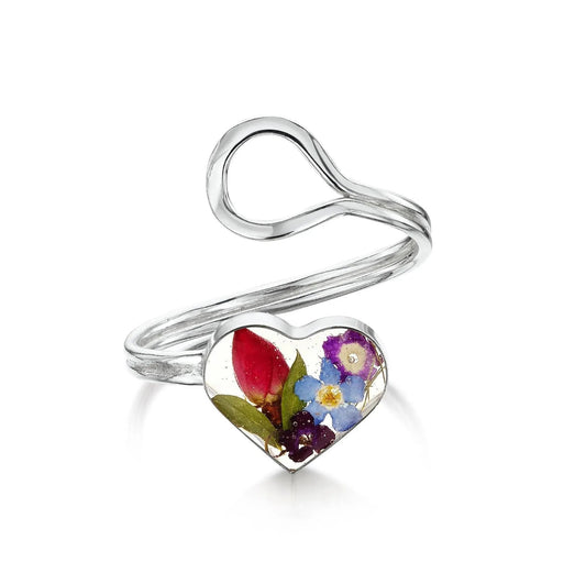 Flower ring by Shrieking Violet Sterling silver adjustable ring. Heart charm filled with tiny flowers including a  miniature rose & forget-me not
