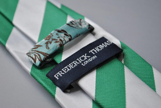 green and white barber striped tie