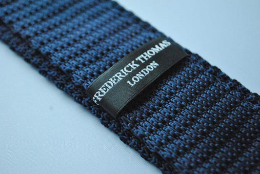 navy blue skinny knitted tie with bright pink polka dots