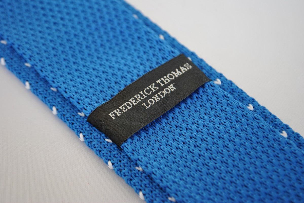 bright royal blue skinny knitted tie with white polka dots