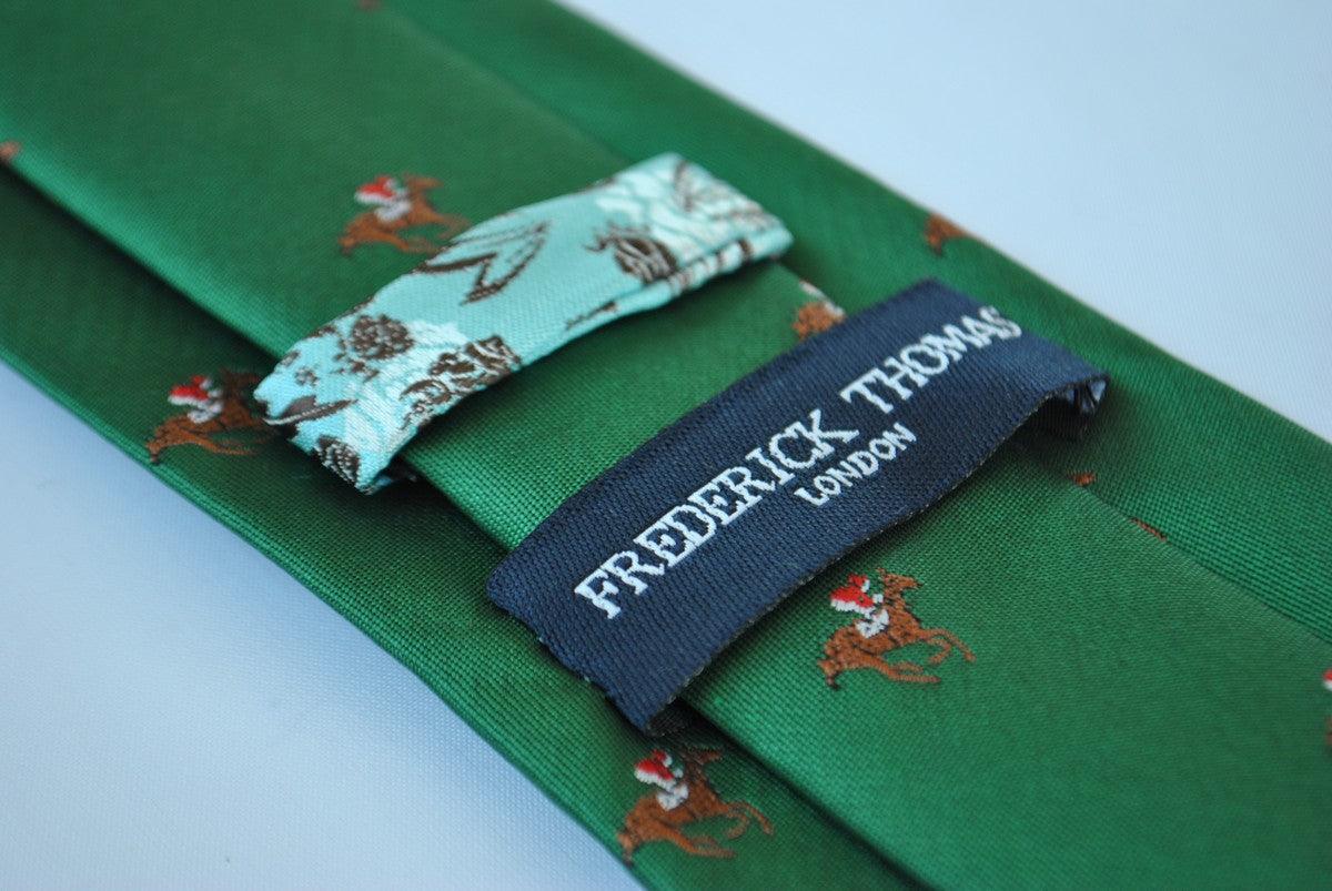 dark green tie with horse racing design