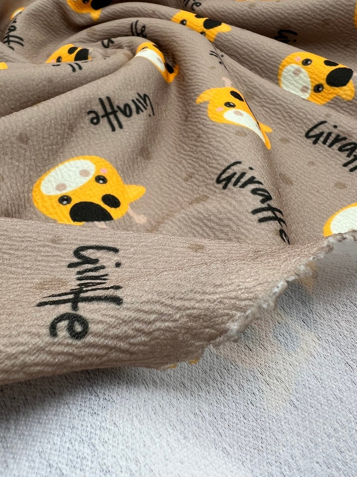 Giraffe Print Liverpool Bullet Stretch Fabric