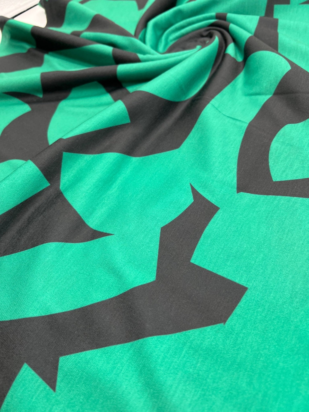 Green Black Spun Poly Stretch Fabric