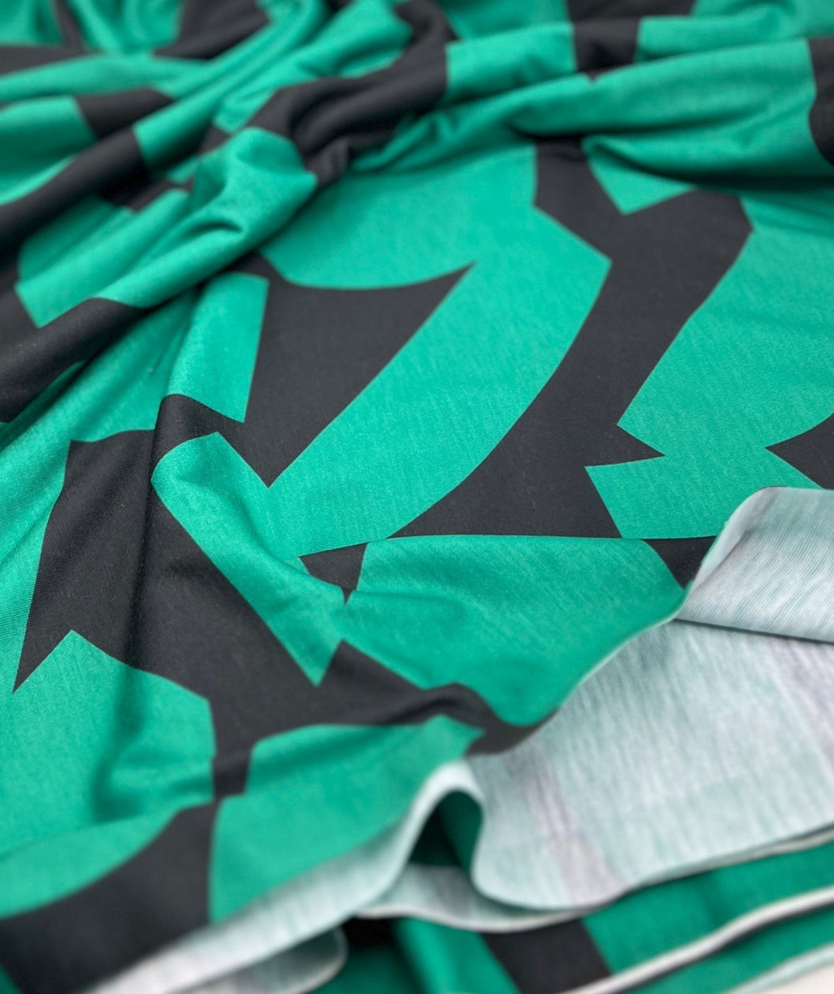 Green Black Spun Poly Stretch Fabric