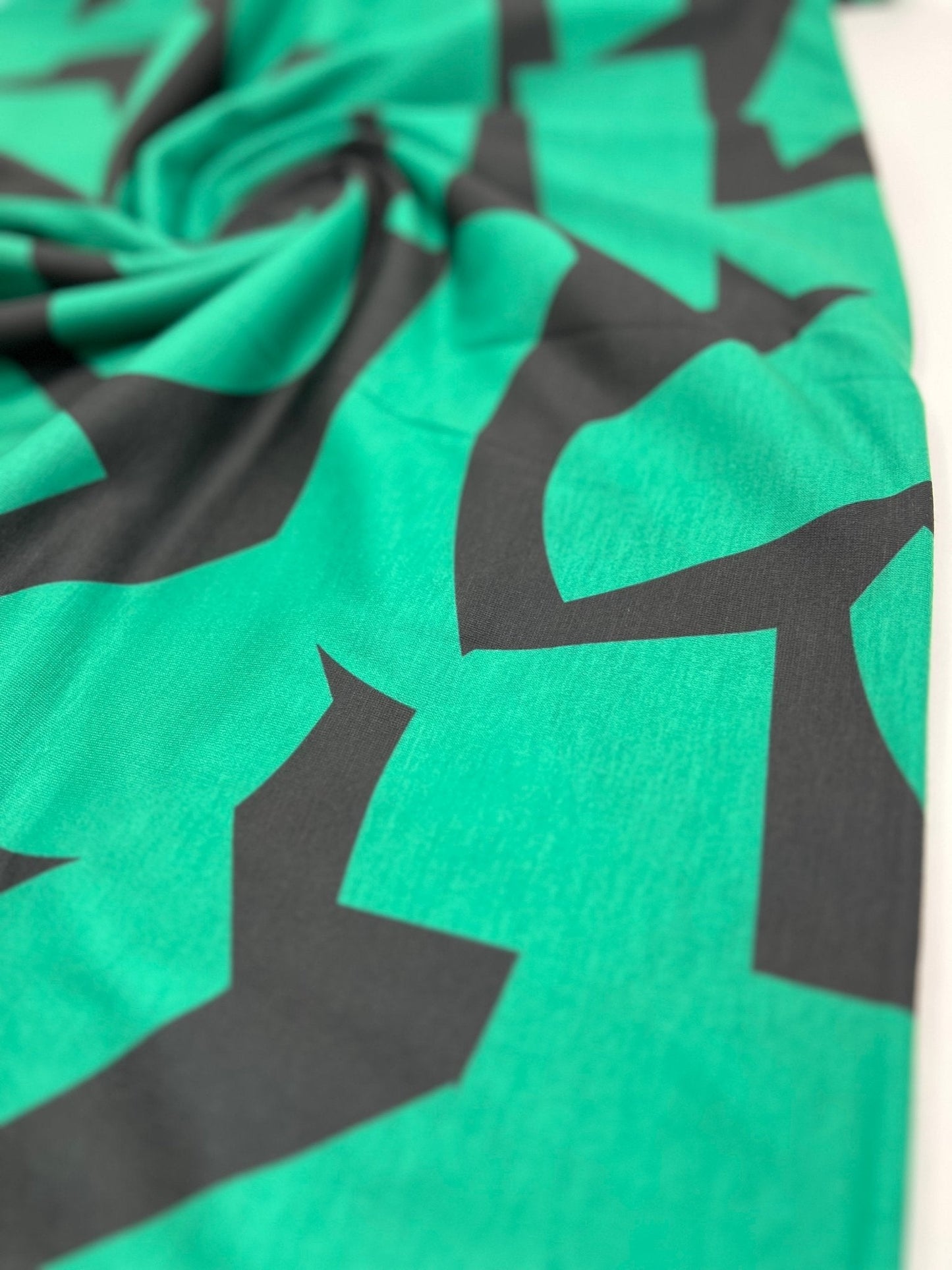 Green Black Spun Poly Stretch Fabric
