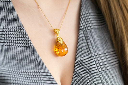 Gold Floral Accent Amber Droplet Pendant