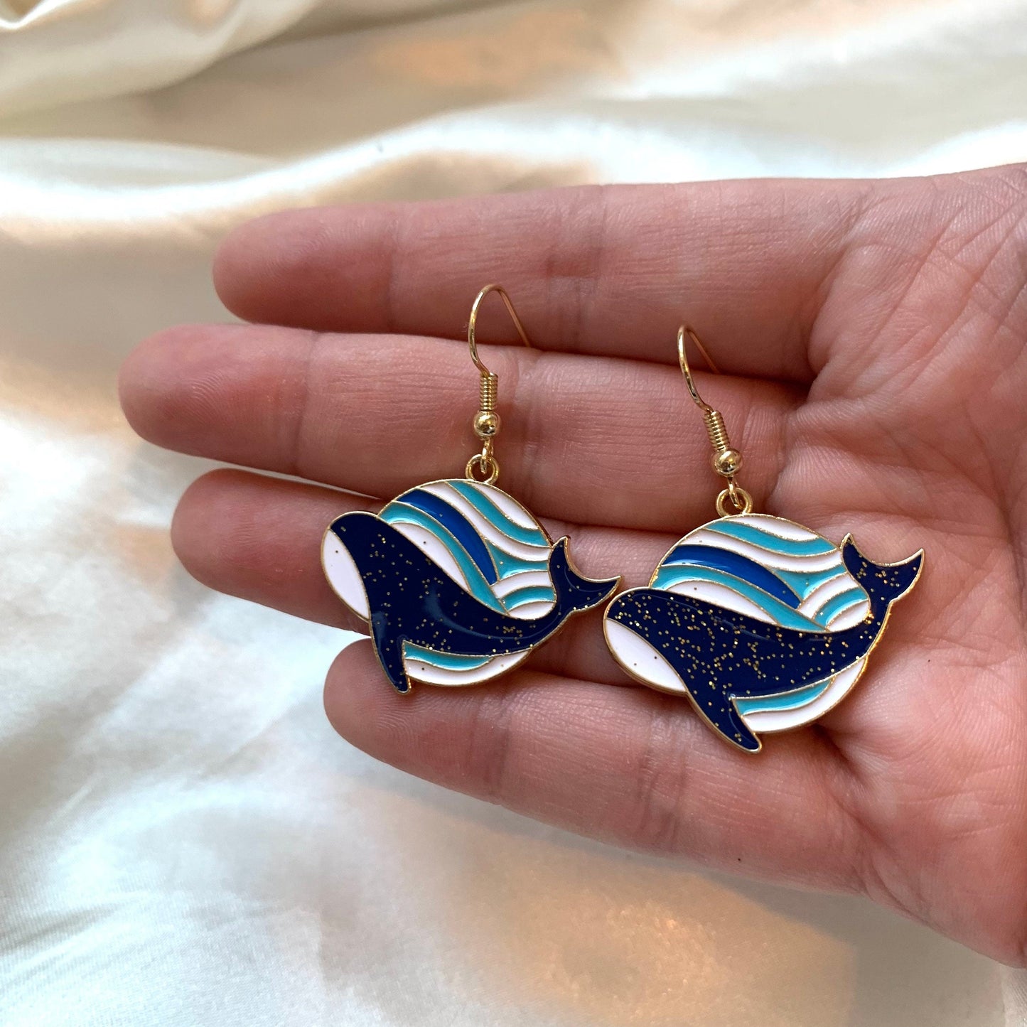 Blue, white and gold whale with wave earrings
