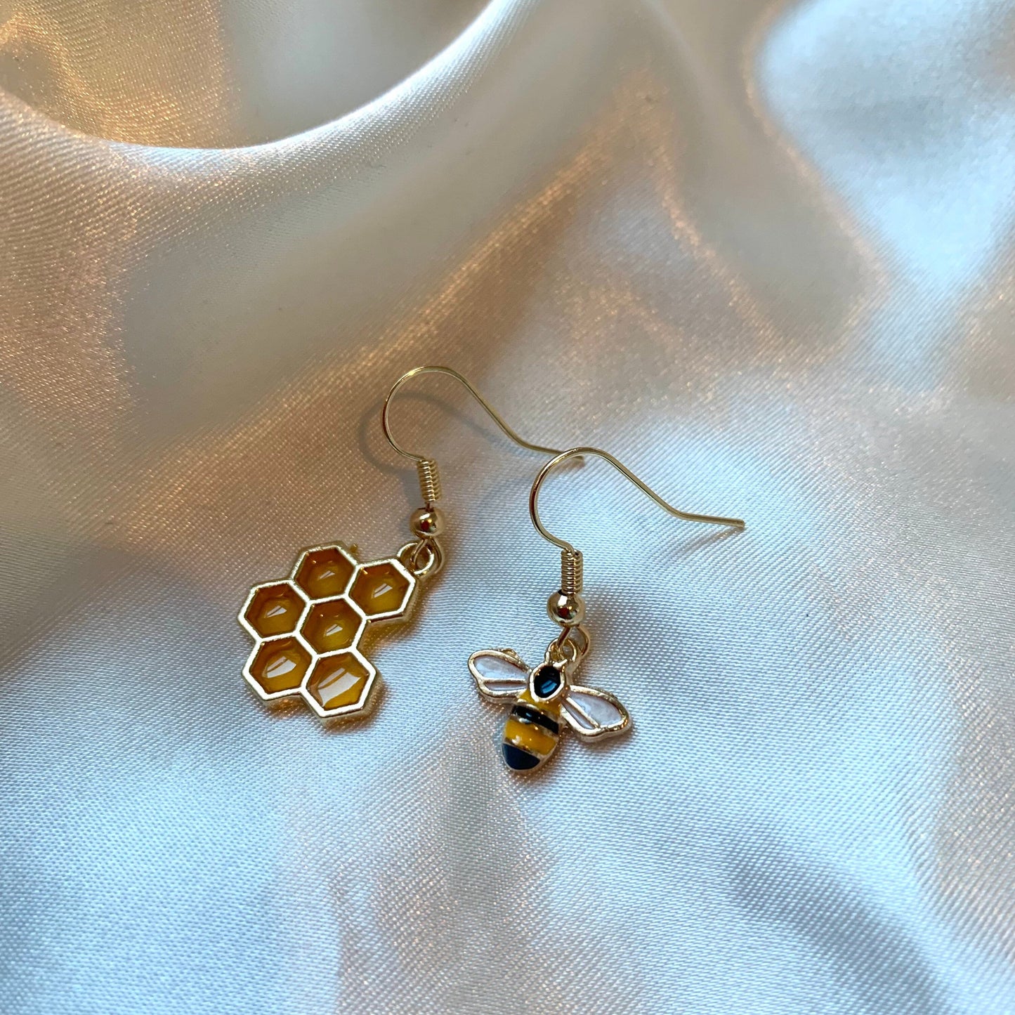 Cool quirky yellow and black gold bee drop dangle earrings with yellow honey comb