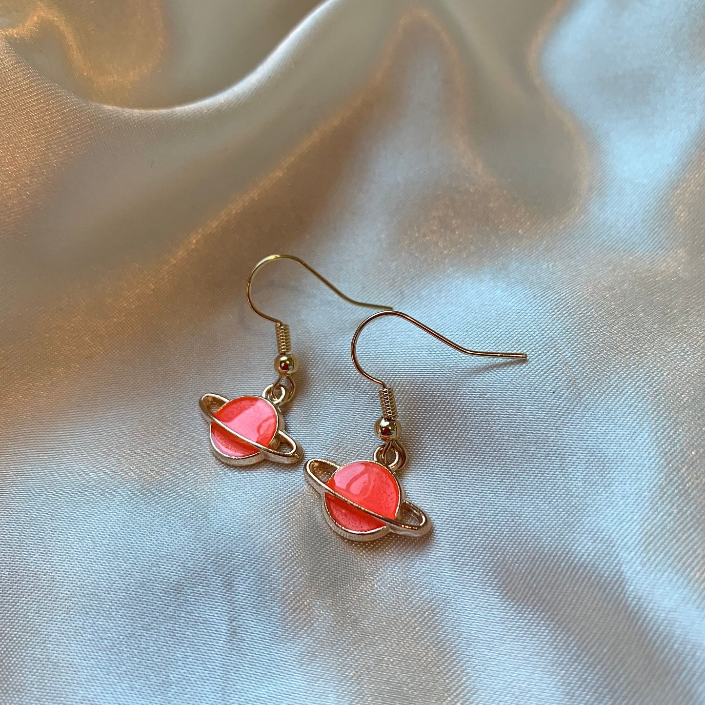 Cool quirky little blue or pink saturn planet drop dangle earrings