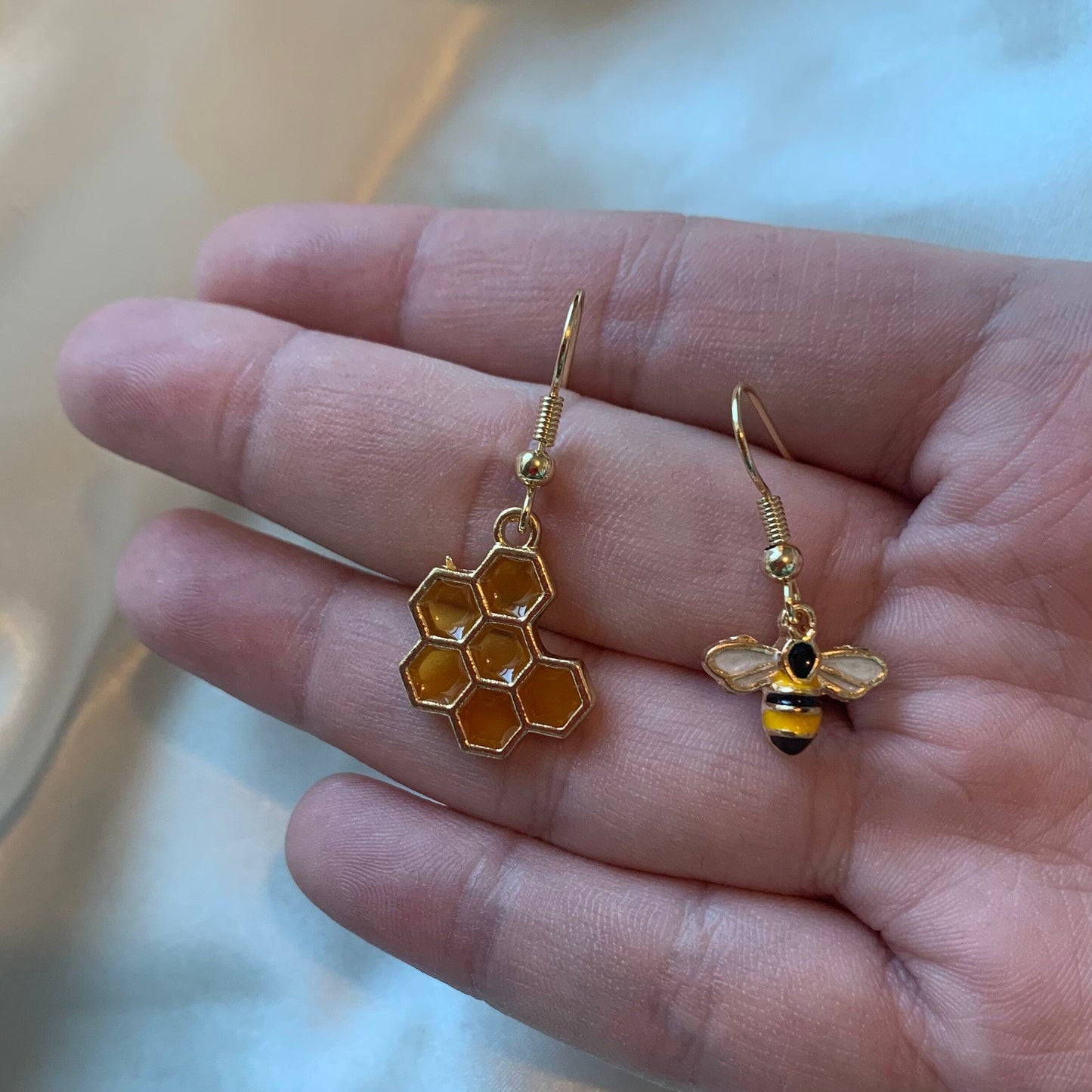 Cool quirky yellow and black gold bee drop dangle earrings with yellow honey comb