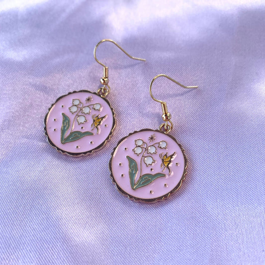 Pink circle with flowers and butterfly dangle gold earrings